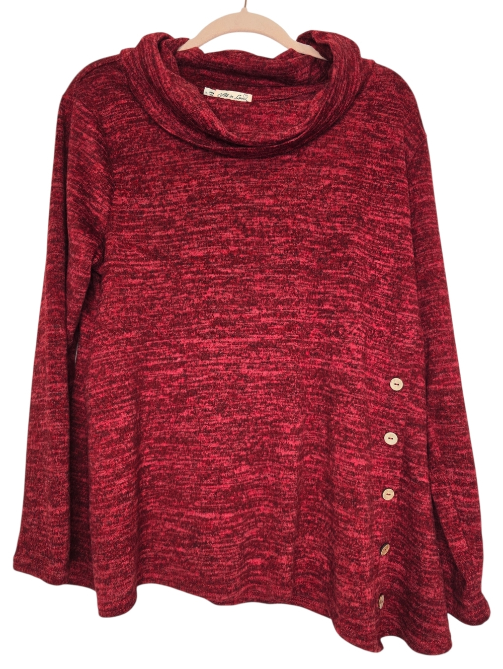 All in Love cozy cowl neck and distinctive side button detailing